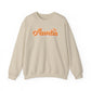 Beige sweatshirt with 'Auntie' text in orange on a white background